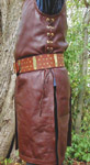 Surcoat sides are grommeted to the waist, and hand-stitched from waist to hem