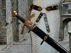 Our Studded Star Swordbelt is based on our Sword Belt of the Circle. Shown in black leather with brass hardware.